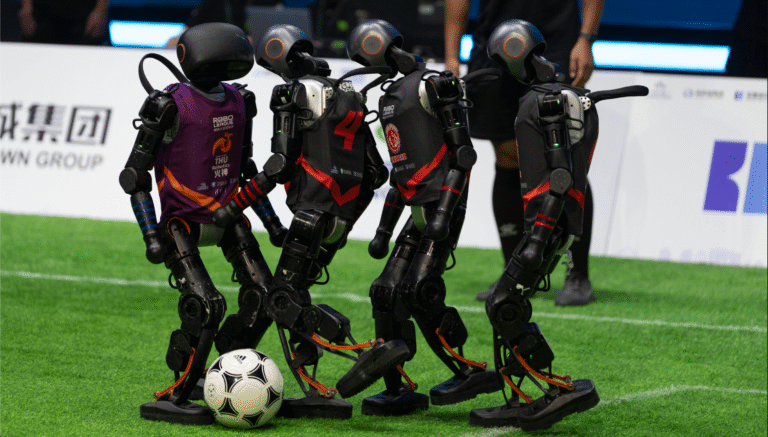 Robots Collapse, Glitch, and Get Stretchered Off in World’s First AI-Powered Football Match World Humanoid Robot Games China Bejing